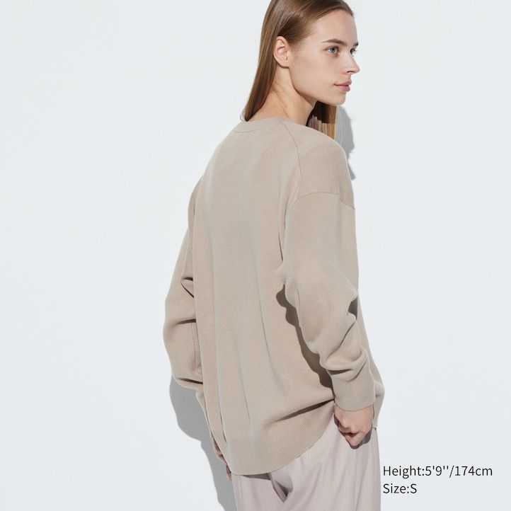 blauer uniqlo damenpullover aus glatter baumwolle mit lockerer passform und rundhalsausschnitt