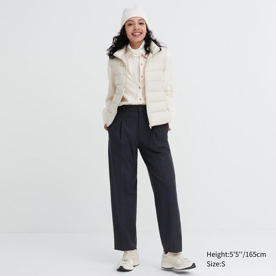 marineblaue uniqlo heattech-streifentops für damen mit falten