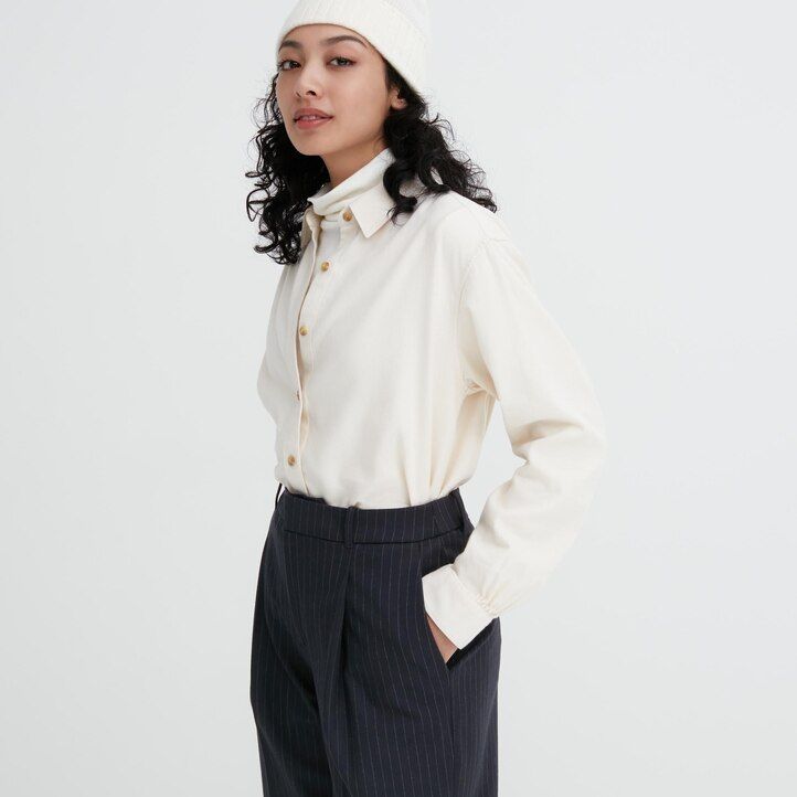 marineblaue uniqlo heattech-streifentops für damen mit falten